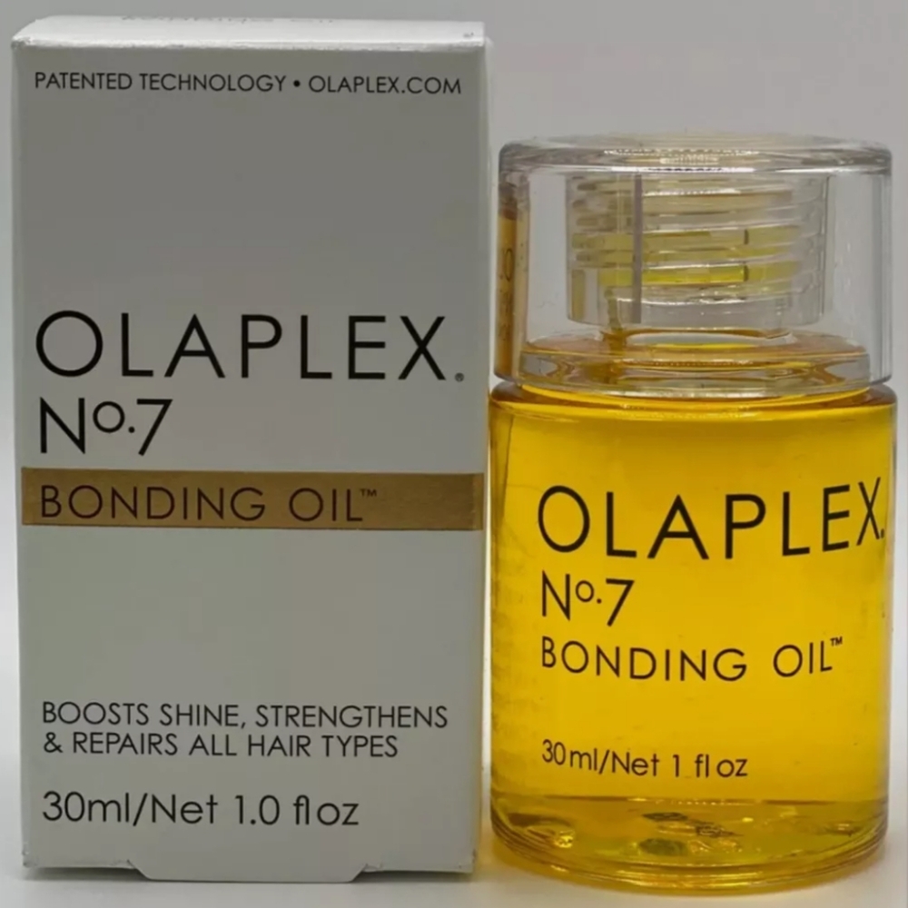OLAPLEX N°7 Bonding Oil Serum boosts shine color vibrancy repairs all hair types